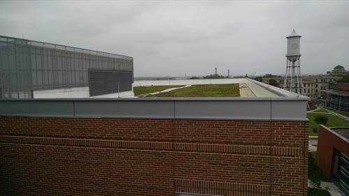 <p>The buildings include green roofs and a system to collect rainwater to use to flush toilets in the buildings.</p>